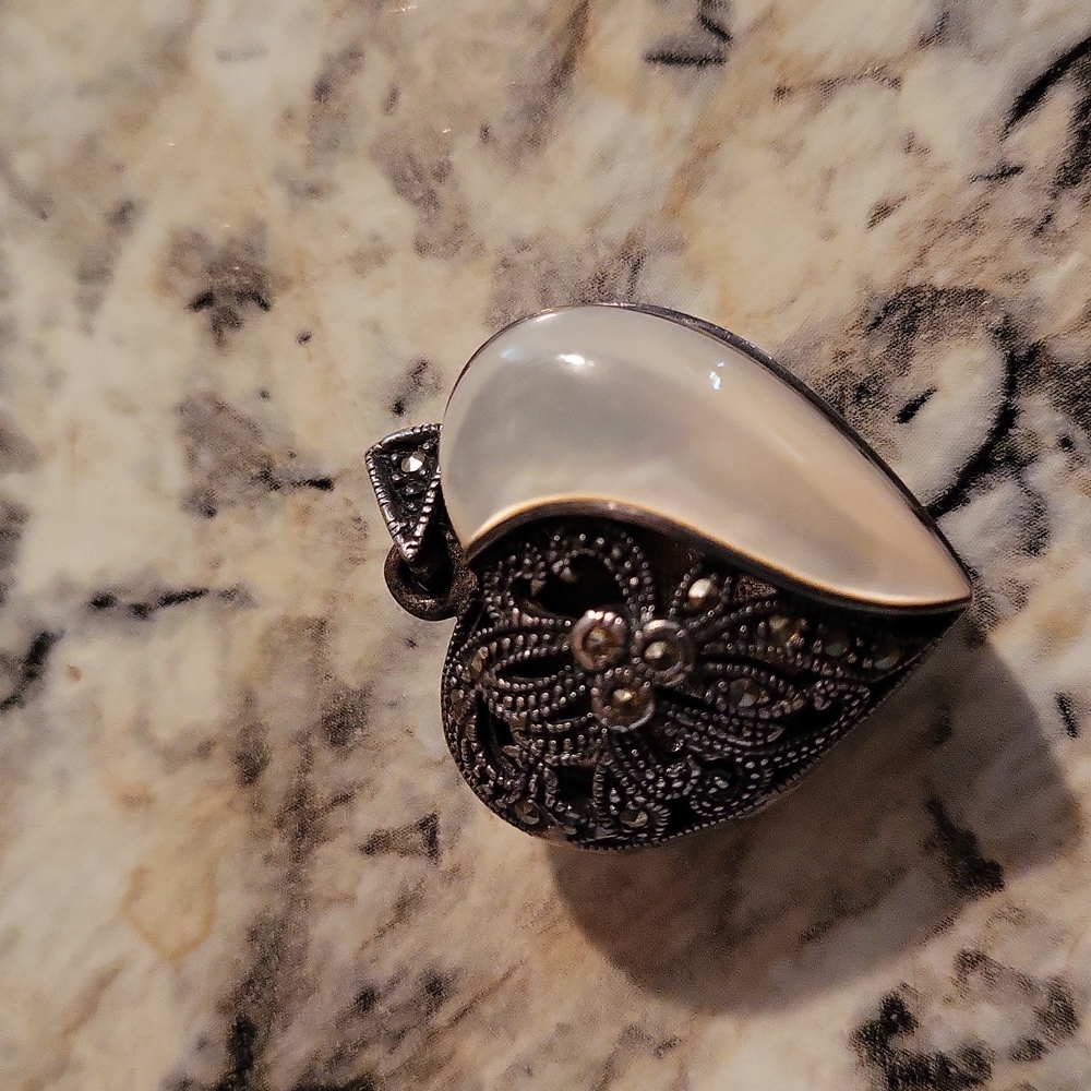 Tiffany and Company necklace and opal locket